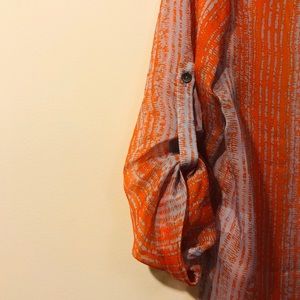 ZOA New York sheer v-neck blouse.